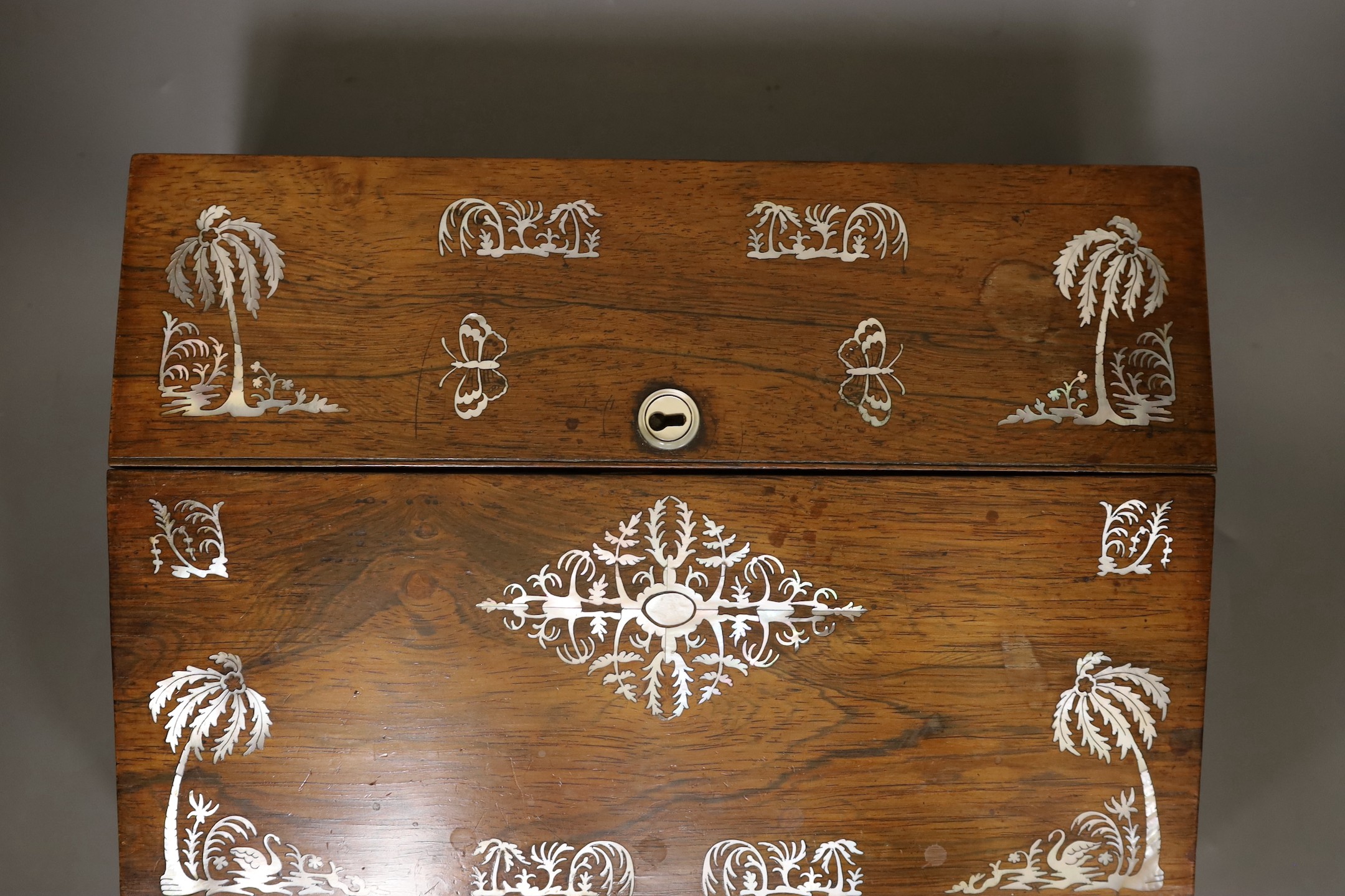 A 19th century rosewood veneered, mother of pearl inlaid writing slope, 35cms wide x 26cms deep